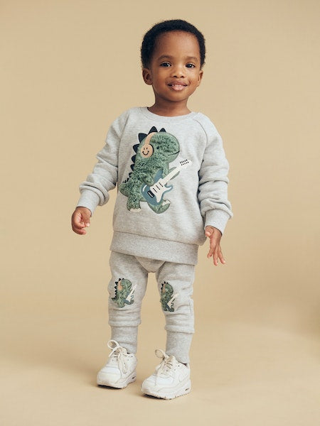 FURRY DINO SWEATSHIRT